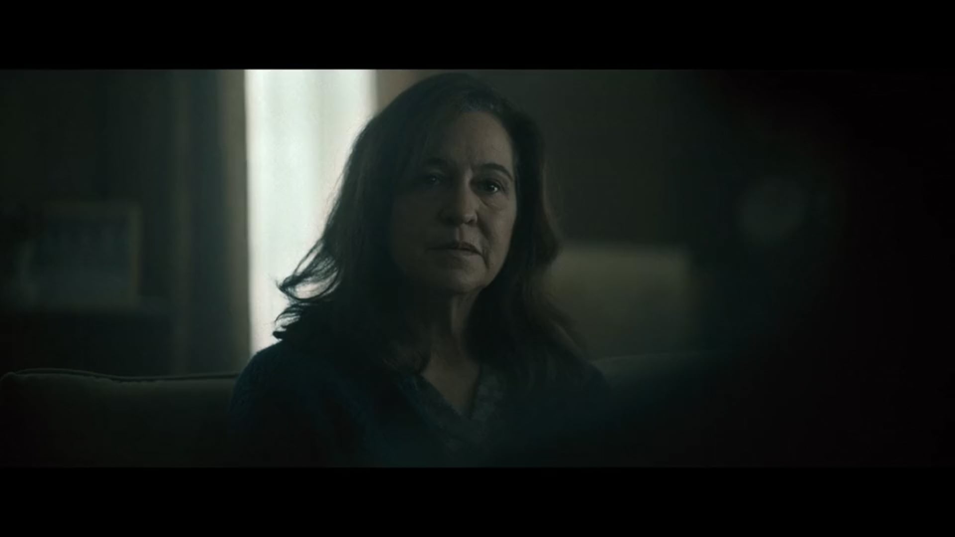 GRIEF-STRICKEN MOTHER