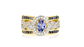 80 Carat Tanzanite and .60 ct. t.w. Sapphire Ring with .30 ct. t.w. White Zircon in 18kt Gold Over Sterling