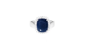 4.50 Carat Sapphire and .20 ct. t.w. White Topaz Ring in Sterling Silver