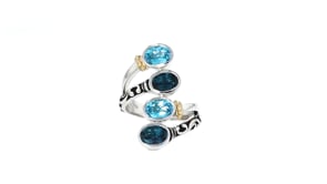 3.70 ct. t.w. Swiss and London Blue Topaz Bypass Ring with 14kt Yellow Gold in Sterling Silver