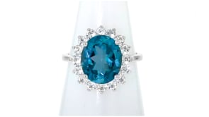 5.40 Carat London Blue Topaz and 1.10 ct. t.w. White Topaz Ring in Sterling Silver