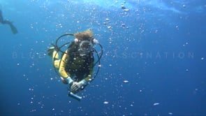 1405_female scuba diver air bubbles slomo