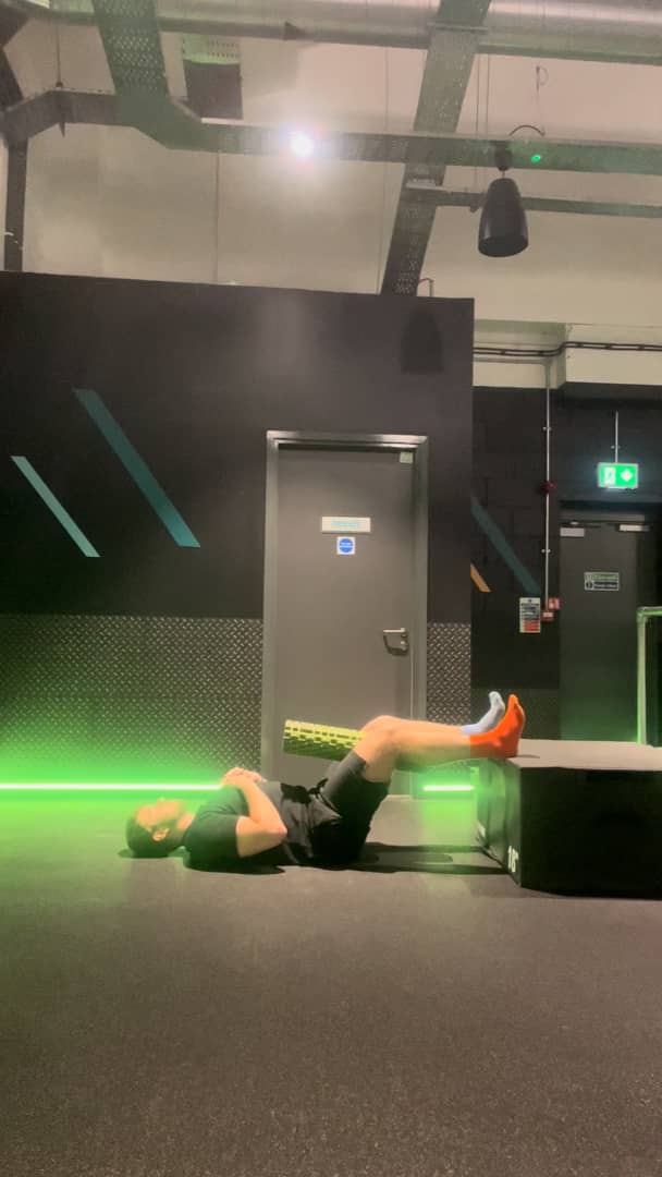 Feet elevated hamstring bridge w roller on Vimeo