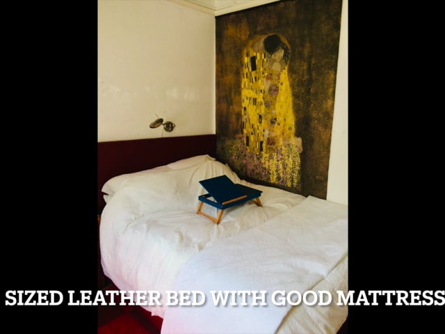 Video 1: King size leather bed.