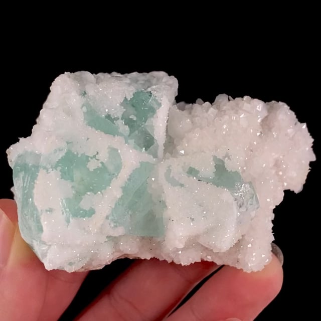 Fluorite coated by Calcite and Quartz