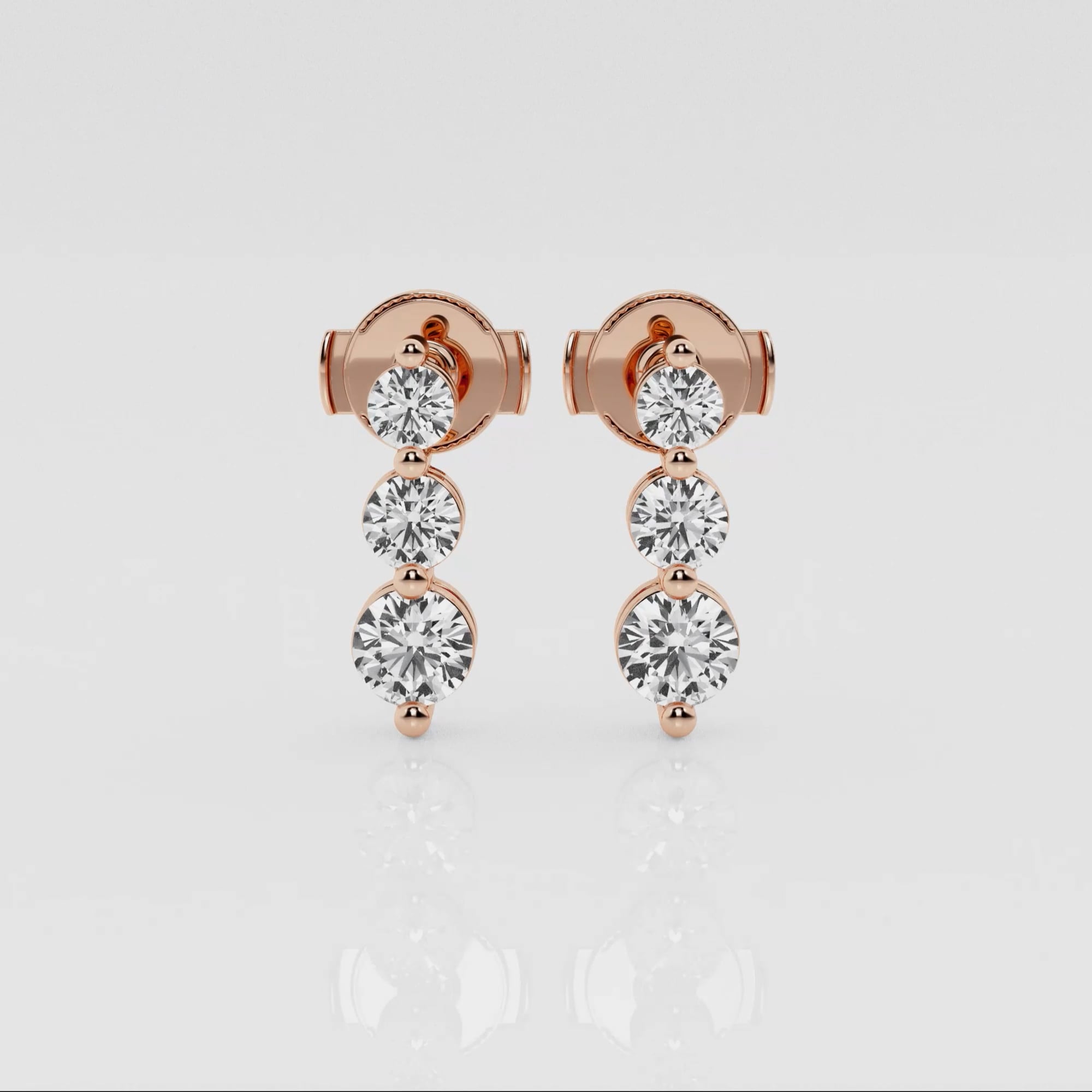 product video for 1 ctw Round Lab Grown Diamond Three-Stone Drop Earrings