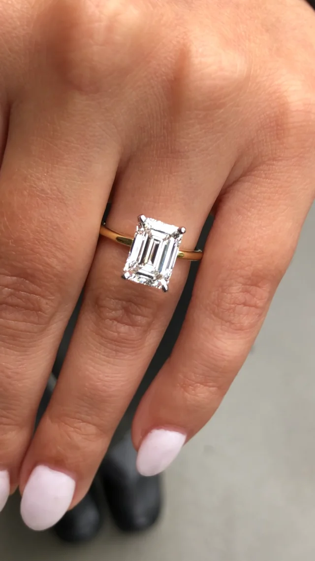 Emerald cut engagement store rings price