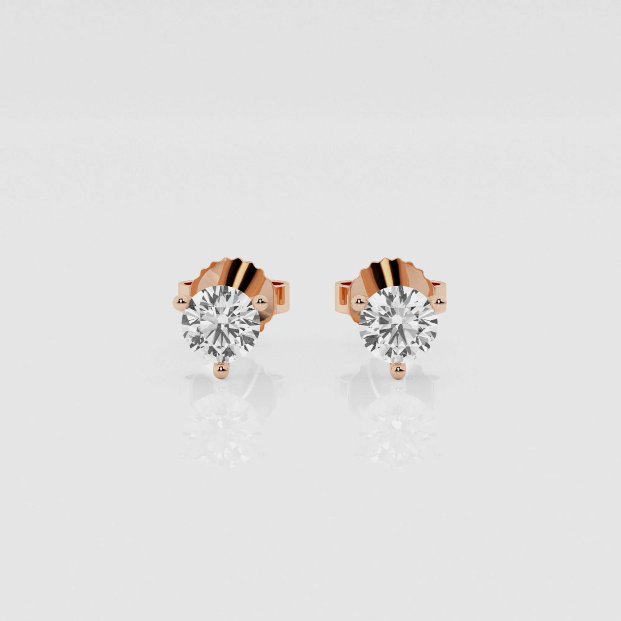 product video for 1/2 ctw Round Near-Colorless Lab Grown Diamond Three Prong Martini Stud Earrings