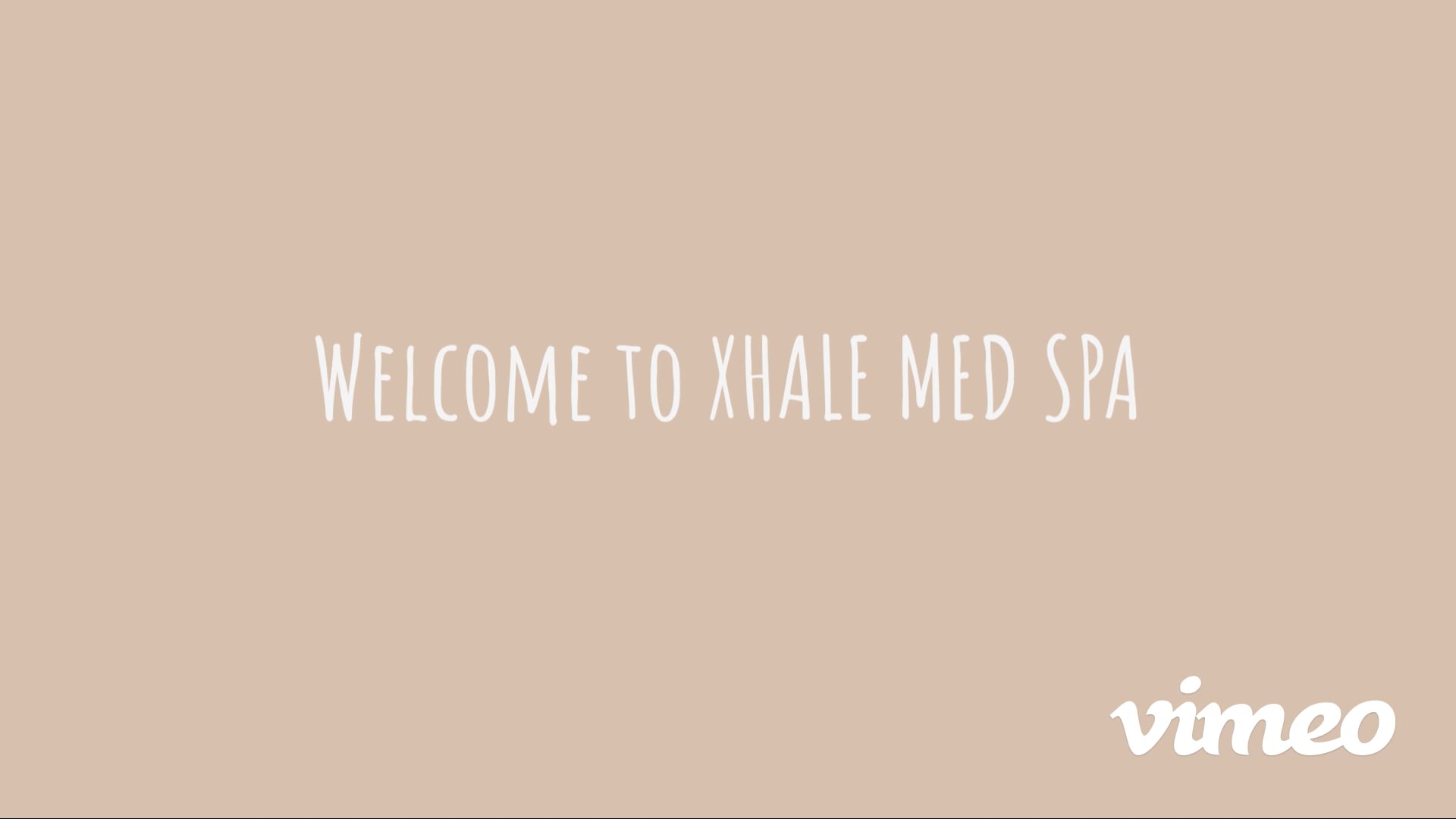 Clean, professional medical spa treatment room with neutral tones at Xhale Medical Spa in Schaumburg
