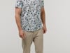 Native Spirit - Men’s eco-friendly tropical print t-shirt (Ivory Floral Blue)