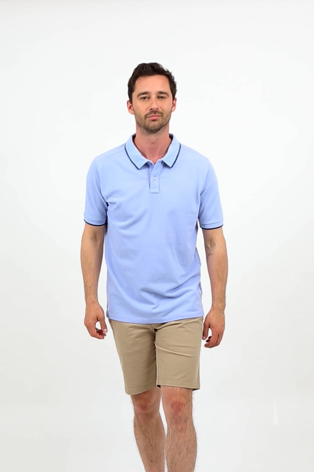 Light blue polo shop and khaki pants