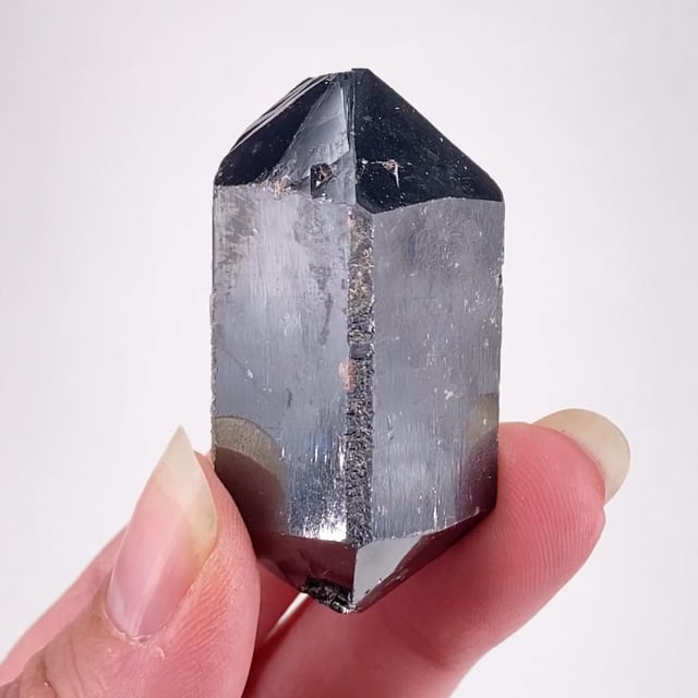 Cassiterite (rare prismatic crystal)