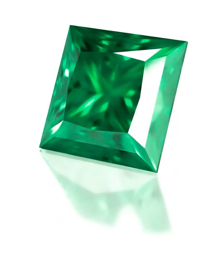 Three-Stone Engagement Ring: white gold, emerald, diamonds