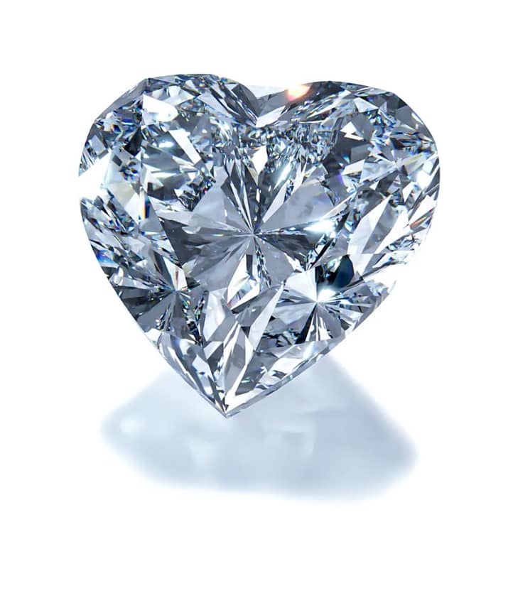 Pure engagement ring: black gold, heart cut diamond