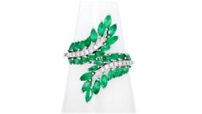 1.60 ct. t.w. Emerald and .10 ct. t.w. Diamond Bypass Ring in Sterling Silver