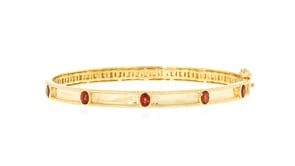 90 ct. t.w. Garnet Station Bangle Bracelet in 18kt Gold Over Sterling