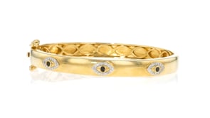 38 ct. t.w. White and Black Diamond Evil Eye Bangle Bracelet in 18kt Gold Over Sterling