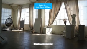 Video Gallery - A corner studio with dark wood paneling, wooden blinds, and a sprawling 8-foot marquee star.