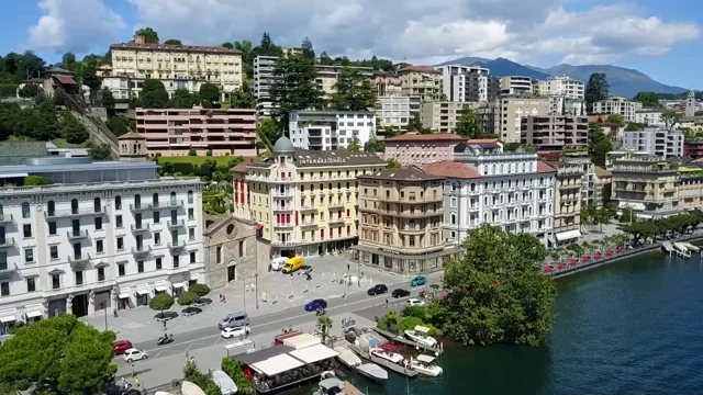 Building opposite our hotel room with attractive facade - housing Louis  Vuitton outlet. - Picture of Hotel International au Lac - Historic &  Lakeside, Lugano - Tripadvisor