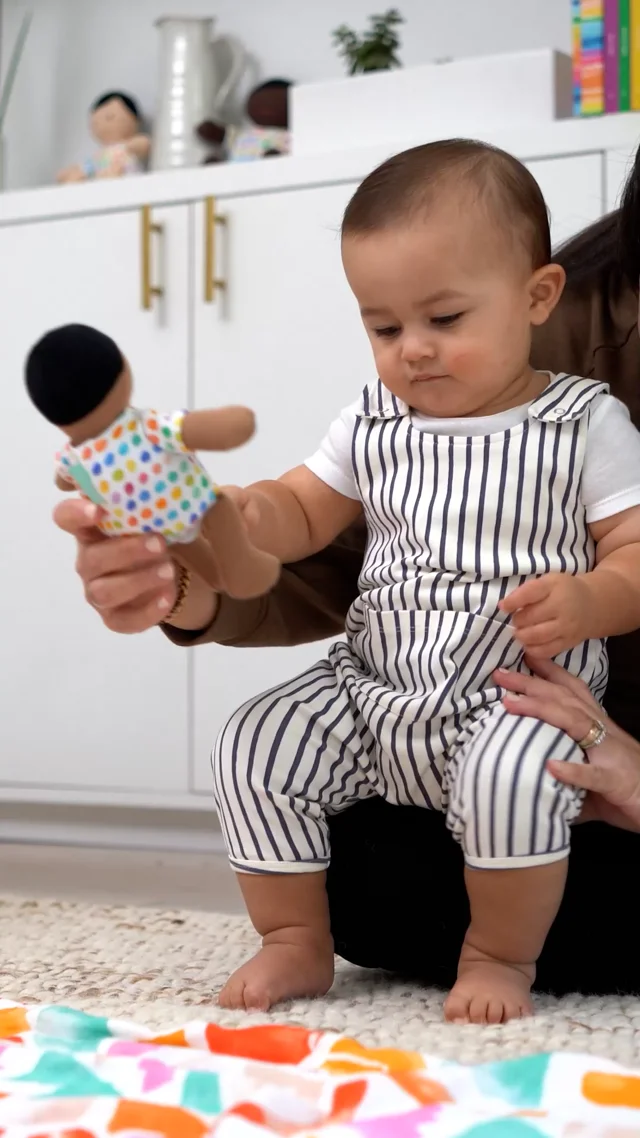 How to help baby balance hot sale when standing