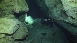 1380_Scuba divers on safety line inside Cenote Tajma Ha, Yucatan Mexico.
