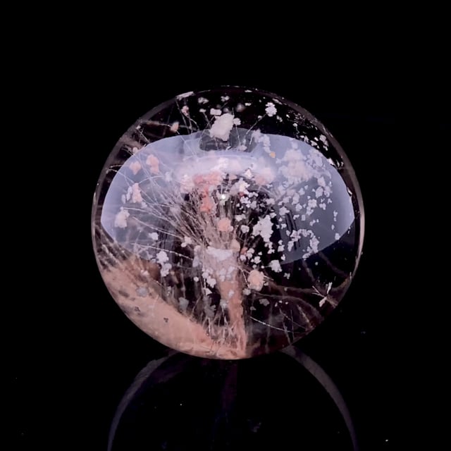 Quartz (polished sphere) with acicular inclusions