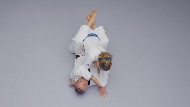 Elbow crush from the guard