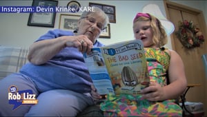 First Grader Reads to Seniors