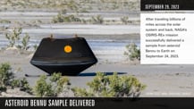 Freeze frame from video, showing black capsule with small orange circle sitting on sandy scrubland with small vegetation. Text at upper right reads September 29, 2023. After travelling billions of miles across the solar system and back, NASA's OSIRIS-REx mission successfully delivered a sample from asteroid Bennu to Earth on September 24, 2023. Title text at lower left: Asteroid Bennu Sample Delivered.