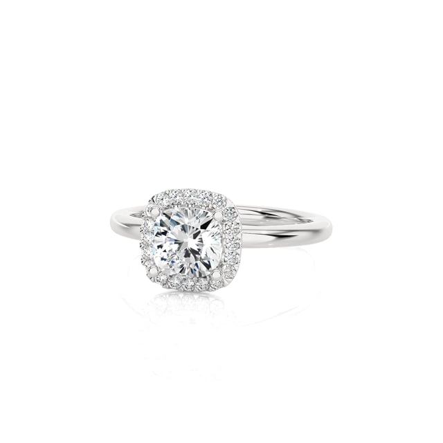 1.50 carat solitaire halo ring with a lab grown cushion diamond in white gold with round lab grown diamonds