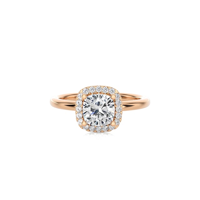 1.20 carat solitaire halo ring with a lab grown cushion diamond in red gold with round lab grown diamonds