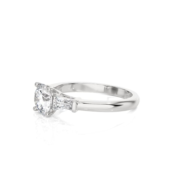 1.00 carat trilogy ring in white gold with round lab grown diamond and lab grown tapered baguettes