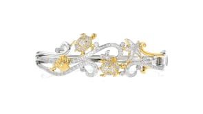 25 ct. t.w. Diamond Sea Life Bangle Bracelet in Two-Tone Sterling Silver