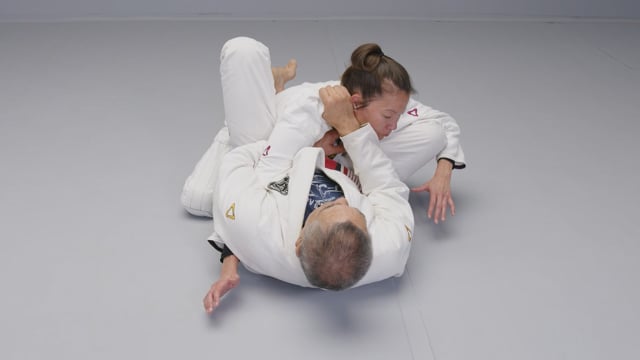 Arm-trapped choke from the guard