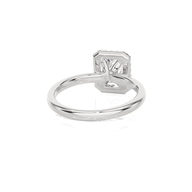 1.20 carat solitaire halo ring with a lab grown emerald cut diamond in white gold with round lab grown diamonds