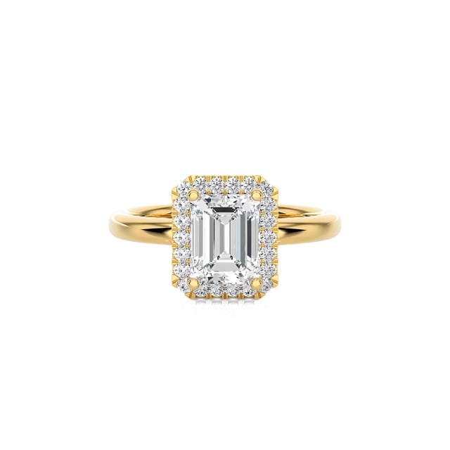 3.00 carat solitaire halo ring with a lab grown emerald cut diamond in yellow gold with round lab grown diamonds
