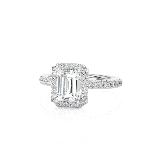 2.50 carat solitaire halo ring with a lab grown emerald cut diamond in white gold with round lab grown diamonds