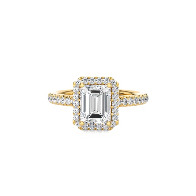1.00 carat solitaire halo ring with a lab grown emerald cut diamond in yellow gold with round lab grown diamonds