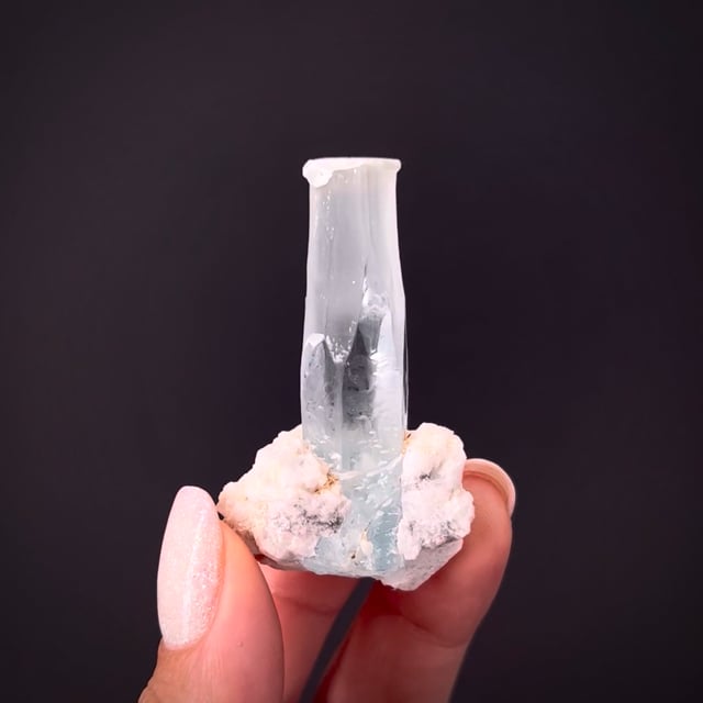 Beryl var. Aquamarine, tapered crystal with Albite