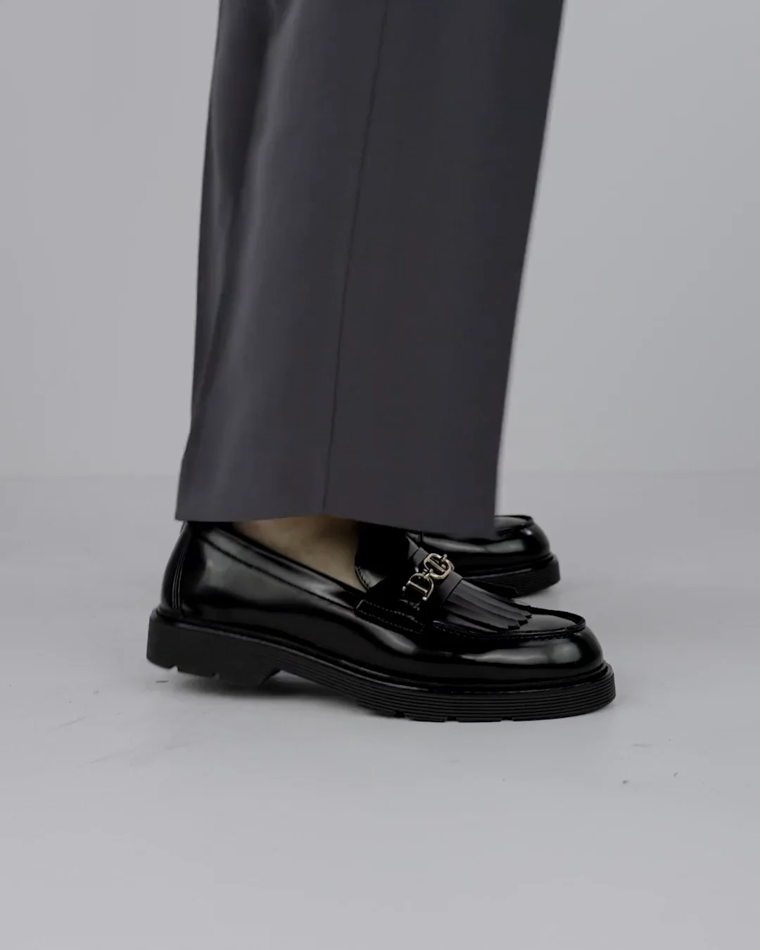 Medallion Heel Loafer