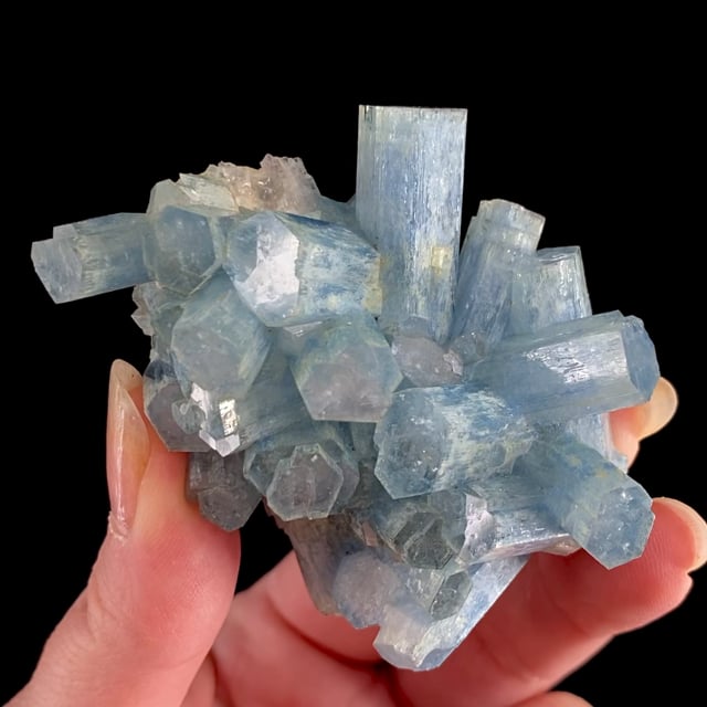 Beryl var: Aquamarine (''cast'' after Quartz)