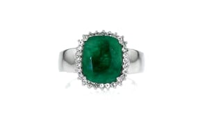 3.00 Carat Emerald and .20 ct. t.w. White Topaz Ring in Sterling Silver
