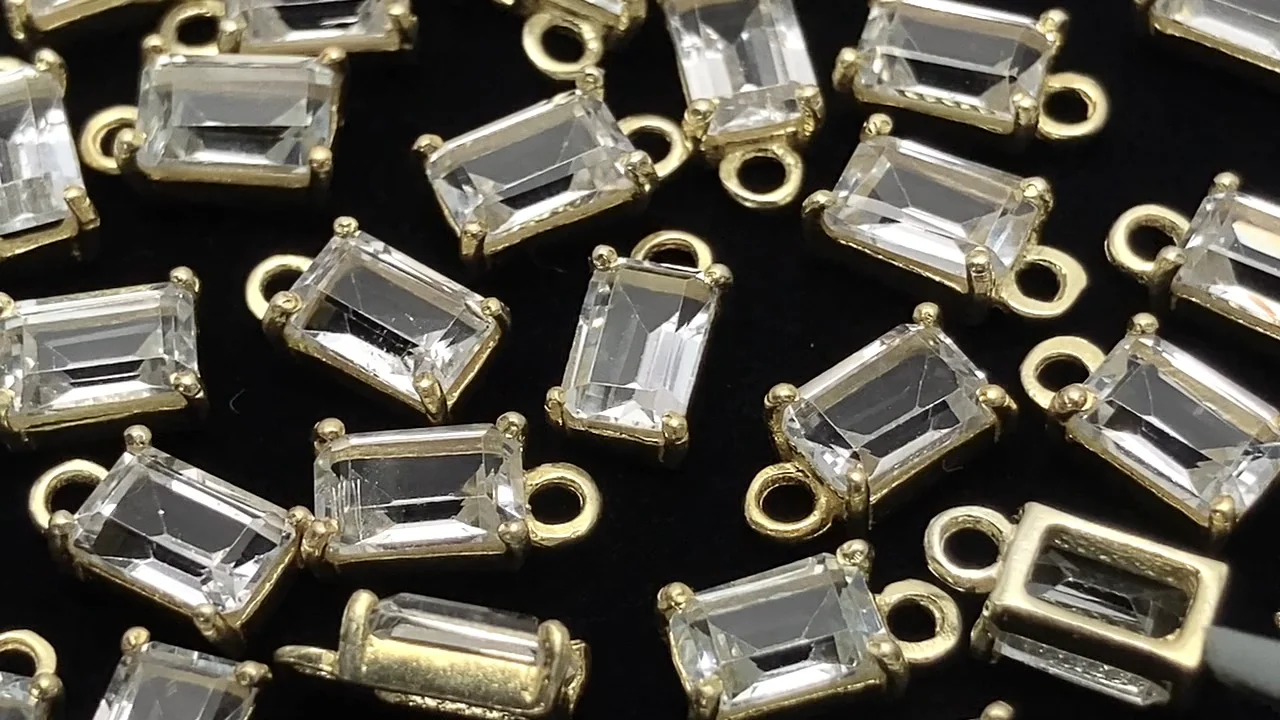宝石質ホワイトトパーズ AAA 枠留めレクタングルファセットカット6×4mm