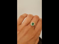 1982701 Colombian Emerald Three Stone Halo Ring