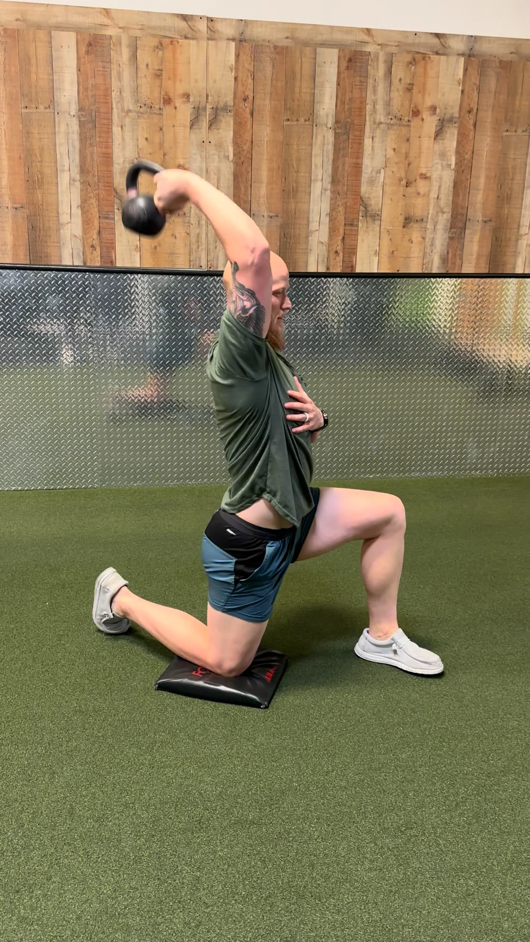 Half Knee SA KB Tricep Ext on Vimeo