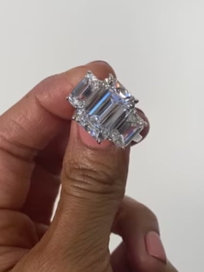 Emerald Cut Center and Side Stone Ring