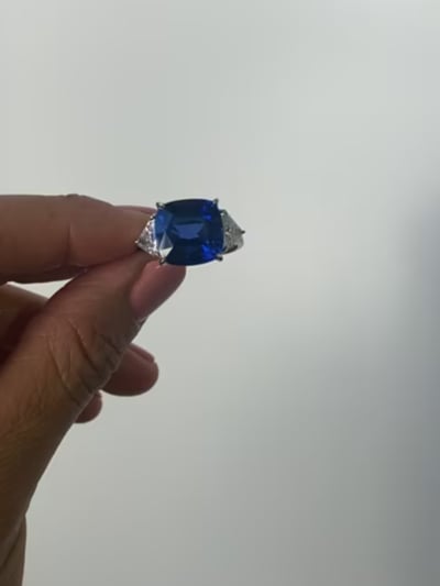 10ct Cushion Center with 1.1ct Trillion cut stones on the sides. Center stone size: 12mm  17328-SAP-CZ-14K