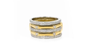 Set of Four .15 ct. t.w. Diamond Stackable Rings in Two-Tone Sterling Silver