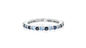 60 ct. t.w. Sapphire and .50 ct. t.w. Blue Topaz Eternity Band in Sterling Silver