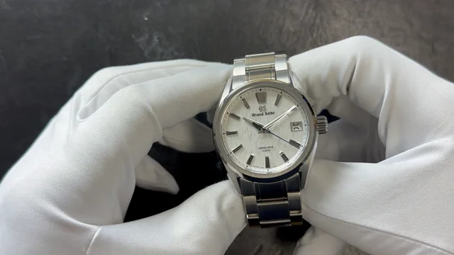 Grand seiko snowflake online vs rolex oyster perpetual